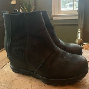 Sorel Joan of Arctic black wedge booties.